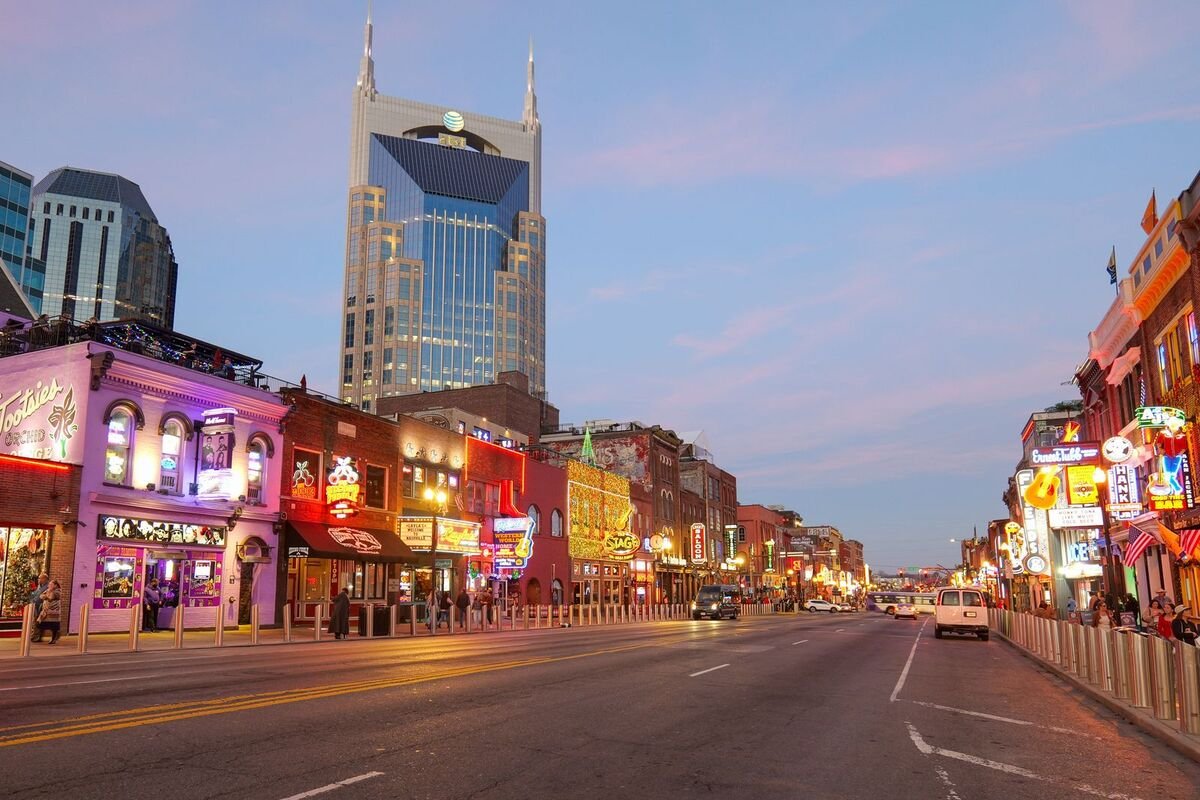 Neon lights of Lower Broadway, Nashville — bachelorette weekend headquarters